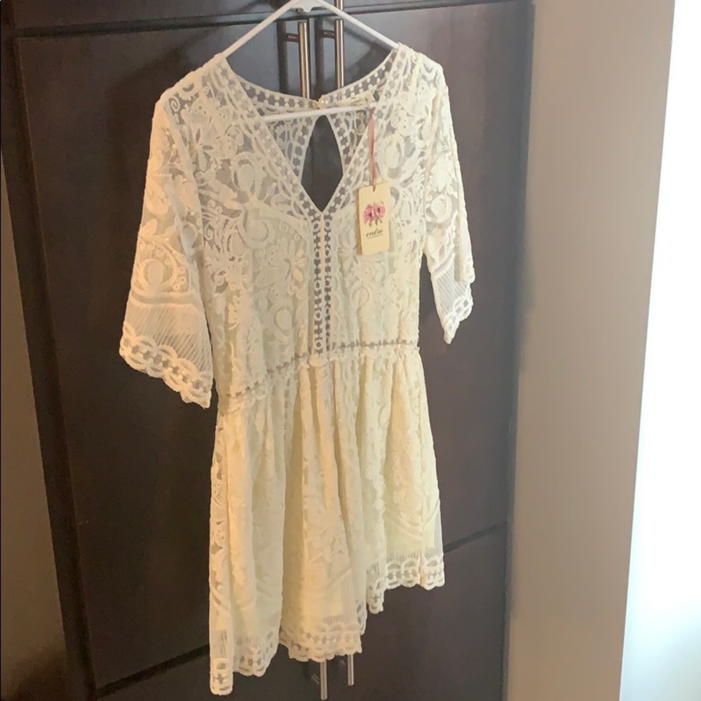 A beautiful cream lace romper